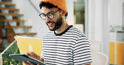 Happy, man and reading on tablet in office for research, schedule update and review newsletter. Male journalist, digital and editing article, story information and feedback for magazine publication