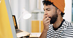 Bored, man and yawn with computer in office for exhaustion, burnout and article deadline. Male journalist, fatigue and tired with online for research, reading story and overworked for publication