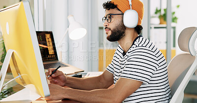 Buy stock photo Creative, web designer and man on computer with headphones for software, graphic design or user interface. Office, professional and person listen to music for online project, website and internet