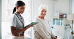 Physical therapy, tablet and woman with senior patient with medical results, consulting and mobility. Physiotherapy, chiropractor and person on digital tech for diagnosis, treatment or rehabilitation