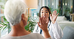 Woman, healthcare and high five with senior patient for winning, good job or teamwork at hospital. Female person, touch or bonding with smile for elderly care, success or positivity at clinic checkup