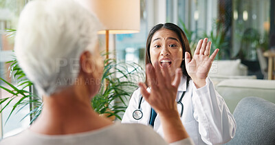 Buy stock photo Woman, senior patient and hand gesture with health consultation for physical activity or mobility. Female person, medical worker or physiotherapist with motion or movement for elderly care at clinic