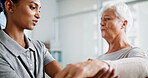 Physical therapy, wrist pain and woman with mature patient for medical service, support and wellness. Healthcare, chiropractor and physical therapist with person for consulting, mobility or arthritis