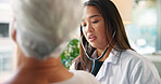 Senior patient, doctor and stethoscope with heart beat in consultation for medical checkup, chest exam and lung test. Healthcare, cardiology and woman with tool to monitor BPM at hospital appointment