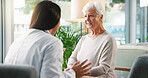 Clinic, women and doctor with senior person, consultation and explanation of diagnosis, chat and office. Healthcare, medical professional and discussion with elderly patient in hospital, help or care