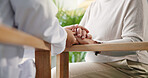 Caregiver, mature person and holding hands for support, elderly care and help for retirement. Medical aid, senior empathy and pensioner with healthcare, wellness and hospice doctor with homecare