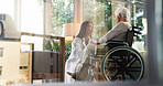 Women, doctor and senior patient in wheelchair at retirement home for healthcare, support and checkup. Caregiver, person with a disability and empathy for medical service, physiotherapy and care