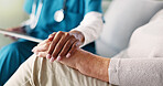 People, hands and nurse with patient for sympathy, comfort or consultation at retirement home. Closeup, doctor or caregiver with senior client for assisted living, empathy or elderly care at house