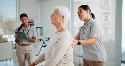 Buy stock photo Physiotherapy, back pain and woman with mature patient for support, wellness and consultation. Healthcare, chiropractor and physical therapist with person for osteoporosis, mobility and arthritis