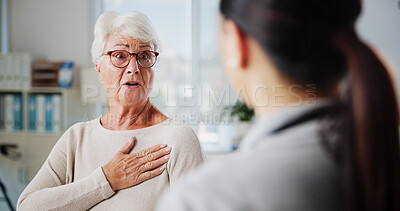 Buy stock photo Discussion, chest pain and healthcare with old woman and doctor for rehabilitation, heart arrhythmia or medical. Cardiologist, help and advice with people in clinic for healing and breathing exam