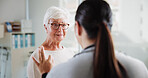 Talking, doctor and smile with old woman in office for patient feedback, insurance and physiotherapy plan. Healthcare, rehabilitation and medical help with people in clinic for consulting and trust