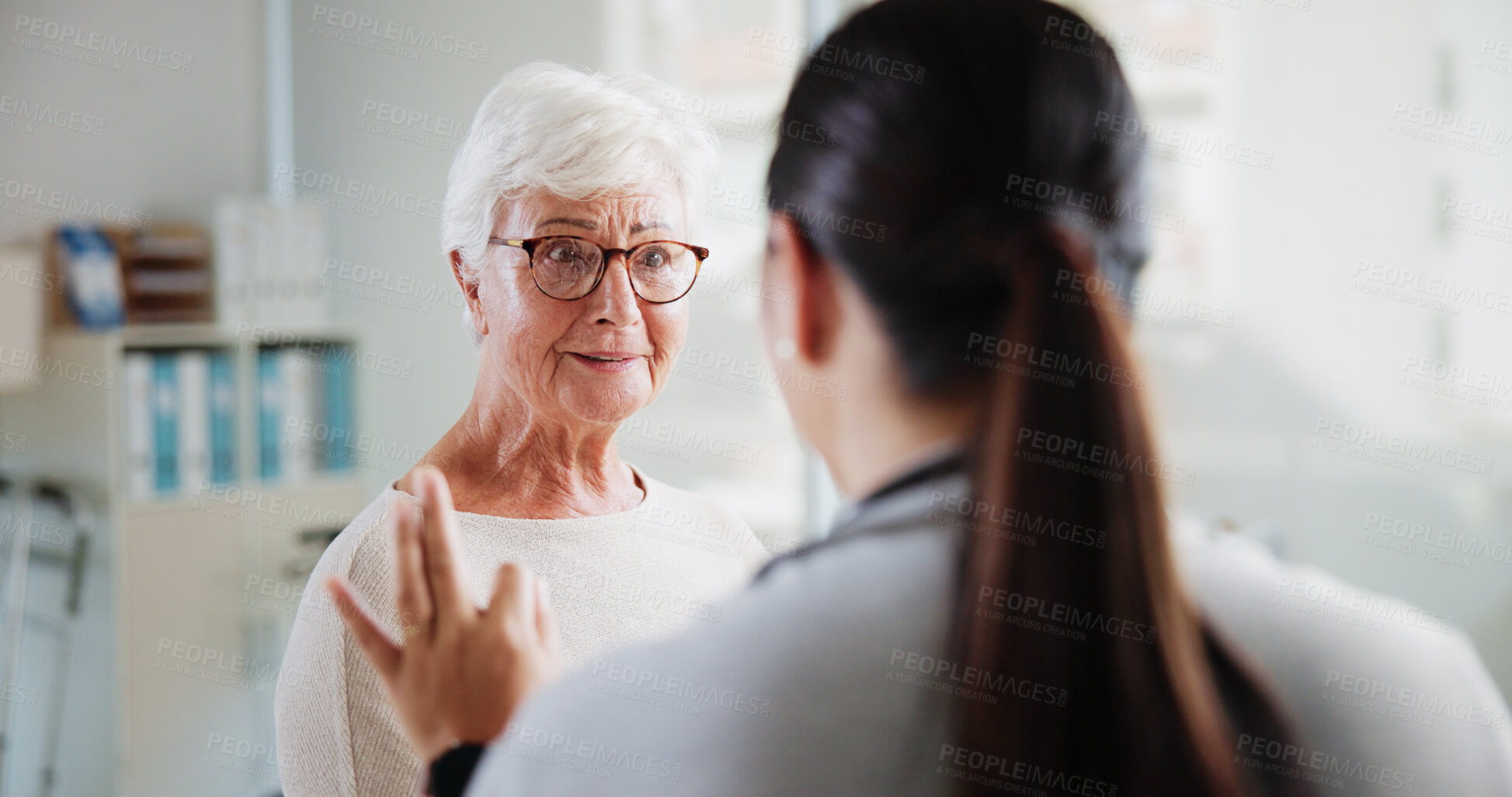 Buy stock photo Talking, doctor and smile with old woman in office for patient feedback, insurance and treatment plan. Healthcare, meeting and medical help with people in clinic for consulting, support and trust