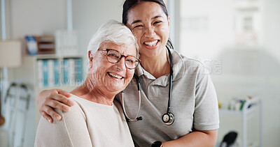 Buy stock photo Senior woman, physiotherapist and hug in portrait at clinic with smile, recovery or medical services. People, elderly patient and embrace for wellness, happy or support in rehabilitation at hospital