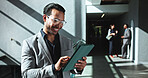 Happy, businessman or research with tablet in hallway for business schedule, agenda or tasks at office. Man, employee or investor with smile on technology for corporate project or design at workplace