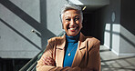 Arms crossed, portrait and smile with business woman in office for conference, keynote speaker and confidence. Capital venture, investor expo and happy with mature person for b2b and account advisor