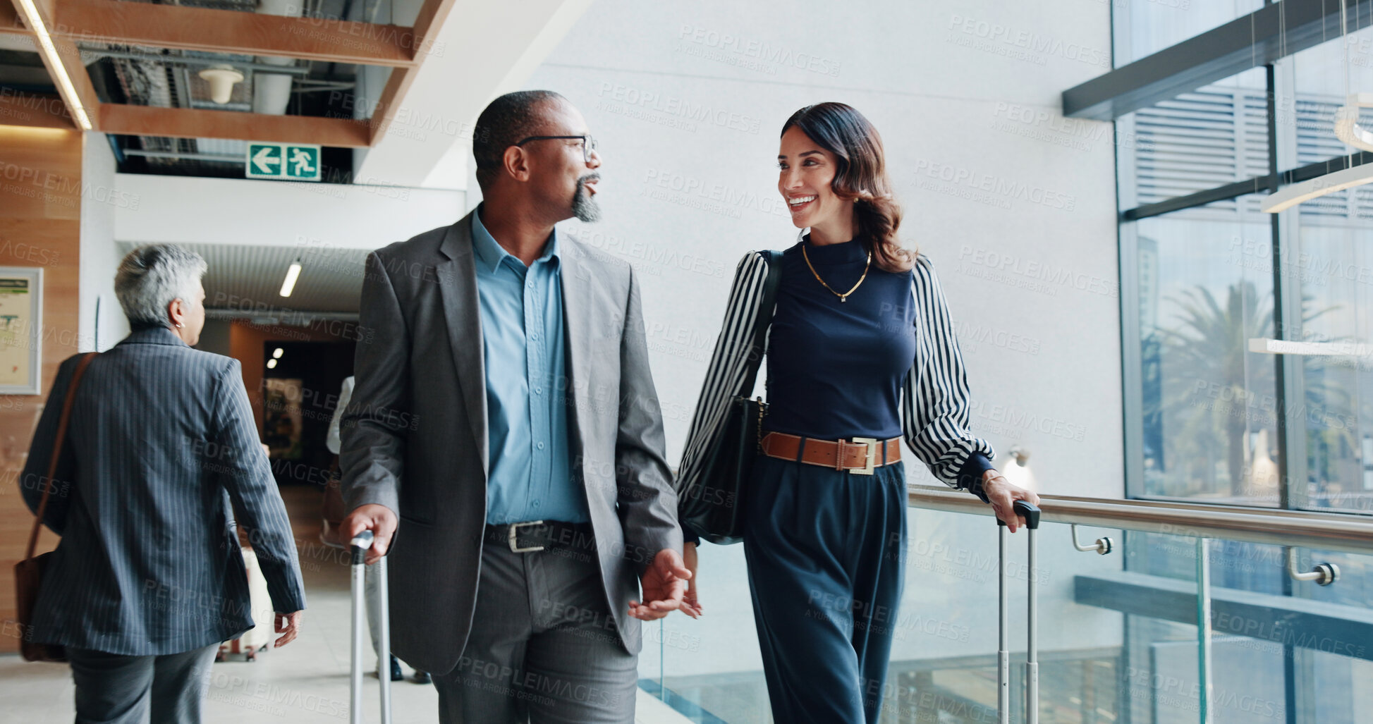 Buy stock photo Airport, colleagues and people with suitcase, travel and conversation for listing, realtor and journey. Happy, man and woman on business trip for seminar, real estate agent and international flight