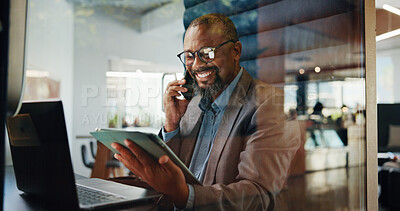 Buy stock photo Laptop, phone call and tablet with business black man in pod for communication or update. App, computer and conversation with mature employee in cubicle for accounting, feedback or hybrid work