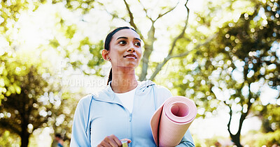 Buy stock photo Fitness, woman or walking with yoga mat at park for wellness workout, thinking or ready for pilates. Below, yogi or thoughtful with equipment in nature for health routine, start exercise or fresh air