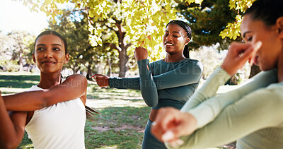 Buy stock photo Park, fitness and women stretching outdoor with friendship, training or wellness exercise. Happy, sports and group of female athletes with arm warm up for health activity with personal trainer