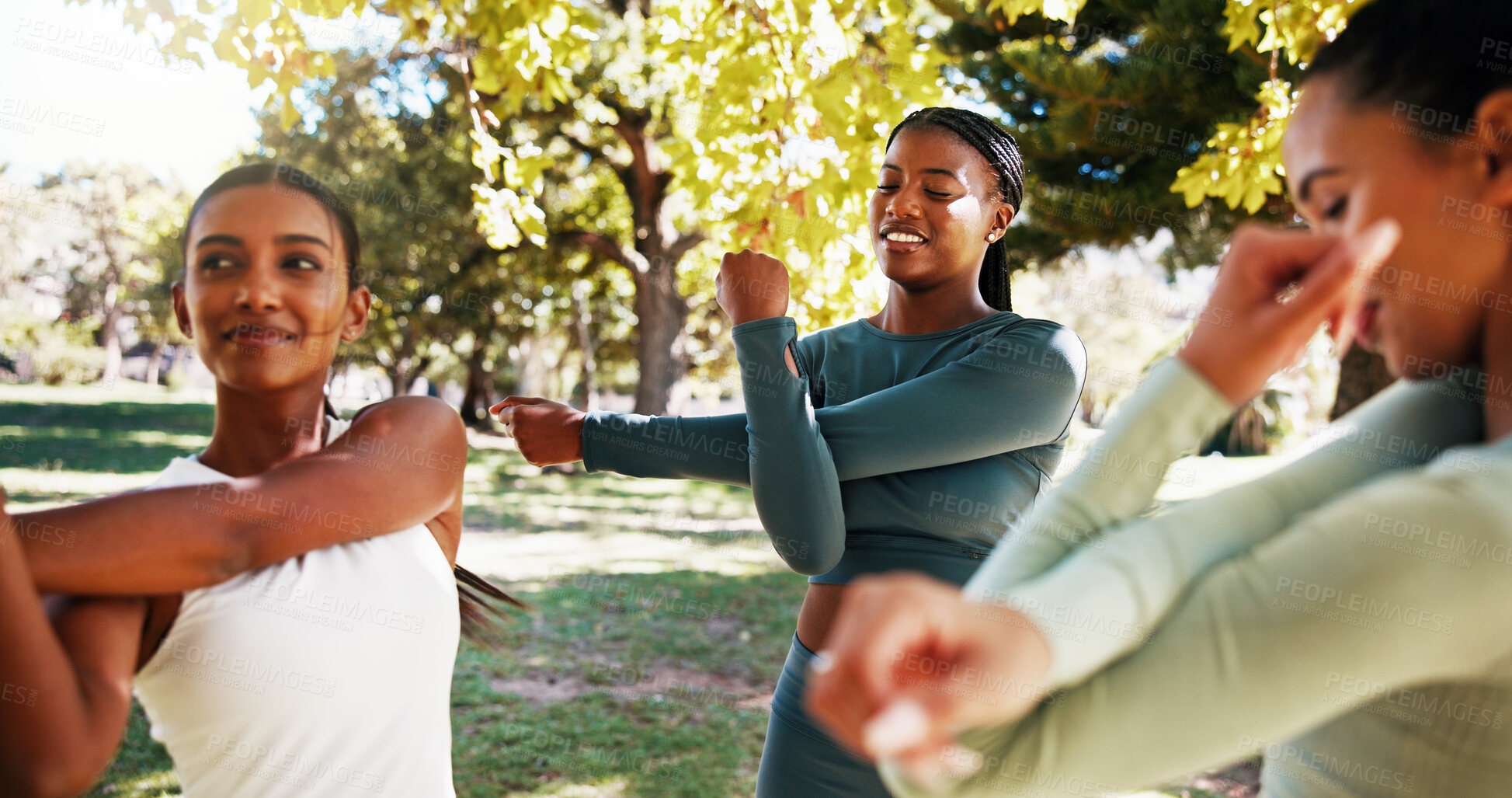 Buy stock photo Park, fitness and women stretching outdoor with friendship, training or wellness exercise. Happy, sports and group of female athletes with arm warm up for health activity with personal trainer