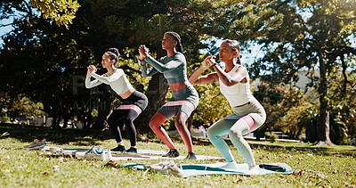 Buy stock photo Women, squat or yoga class with pilates in nature for exercise or balance at outdoor park. Active group, female people or yogi friends with resistance band on mat for fitness, health or wellness