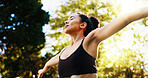 Outdoor, breathing and woman with exercise, stretching and natural with flexibility, morning and calm. Person, yogi or athlete in park, summer or break with workout, wellness and healthy with fitness