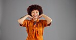 Happy, fashion and portrait of woman in studio with color, stylish and trendy clothing with confidence. Smile, mockup space and female person from Colombia with cool outfit by gray background.