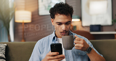 Buy stock photo Relax, drinking coffee and man with phone in home for communication, chat and reading message on app. Sofa, tea and person with mobile for social media, website and check morning news on internet