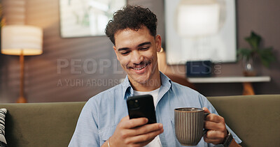 Buy stock photo Relax, coffee and happy man with phone in home for communication, chat and reading message on app. Sofa, drink tea and person with mobile for social media, website and check morning news on internet