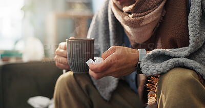 Buy stock photo Hands, tissue and person with tea in living room, sick or health issue with influenza, hayfever or sinusitis. Hot beverage, electrolyte liquid or medicine for illness, wellness and flu at house