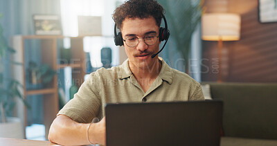 Buy stock photo Man, consultant or remote worker with headset on laptop for online advice or communication at home. Male person, agent or virtual assistant with computer for desktop support, help or service at house