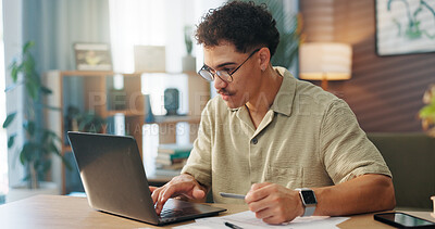 Buy stock photo Business, laptop and remote work with man in home office for startup planning or research. Computer, email and reading with freelance employee at desk in apartment for online review of information