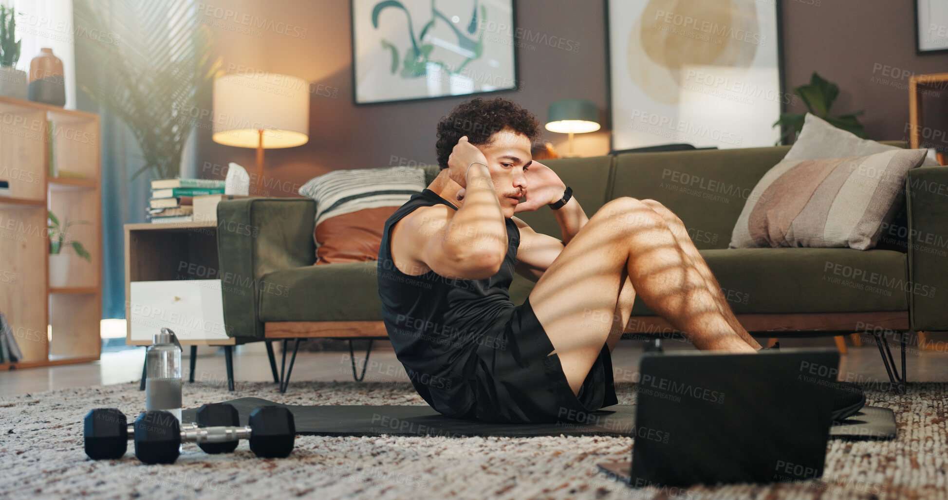 Buy stock photo Fitness, laptop and man in home for sit up, workout and training for muscle strength with website. Exercise, living room and person with computer for online tutorial, video and streaming for wellness