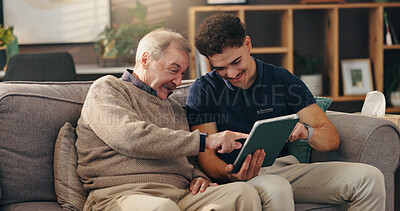 Buy stock photo Old man, nurse and tablet on couch, happy and help for streaming movie with point at apartment. Caregiver, elderly person and touchscreen for film, app and subscription with laugh in retirement home