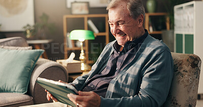 Buy stock photo Senior man, tablet and laugh on couch, relax and happy with streaming, movie and comedy show on web in home. Elderly person, touchscreen and app for funny film, social network and smile in retirement