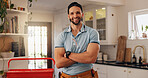 Plumber, arms crossed and portrait of man in kitchen for maintenance, house renovation and drainage repairman. Handyman, toolbox and pipe inspection with person in home for diy, labor and upgrade