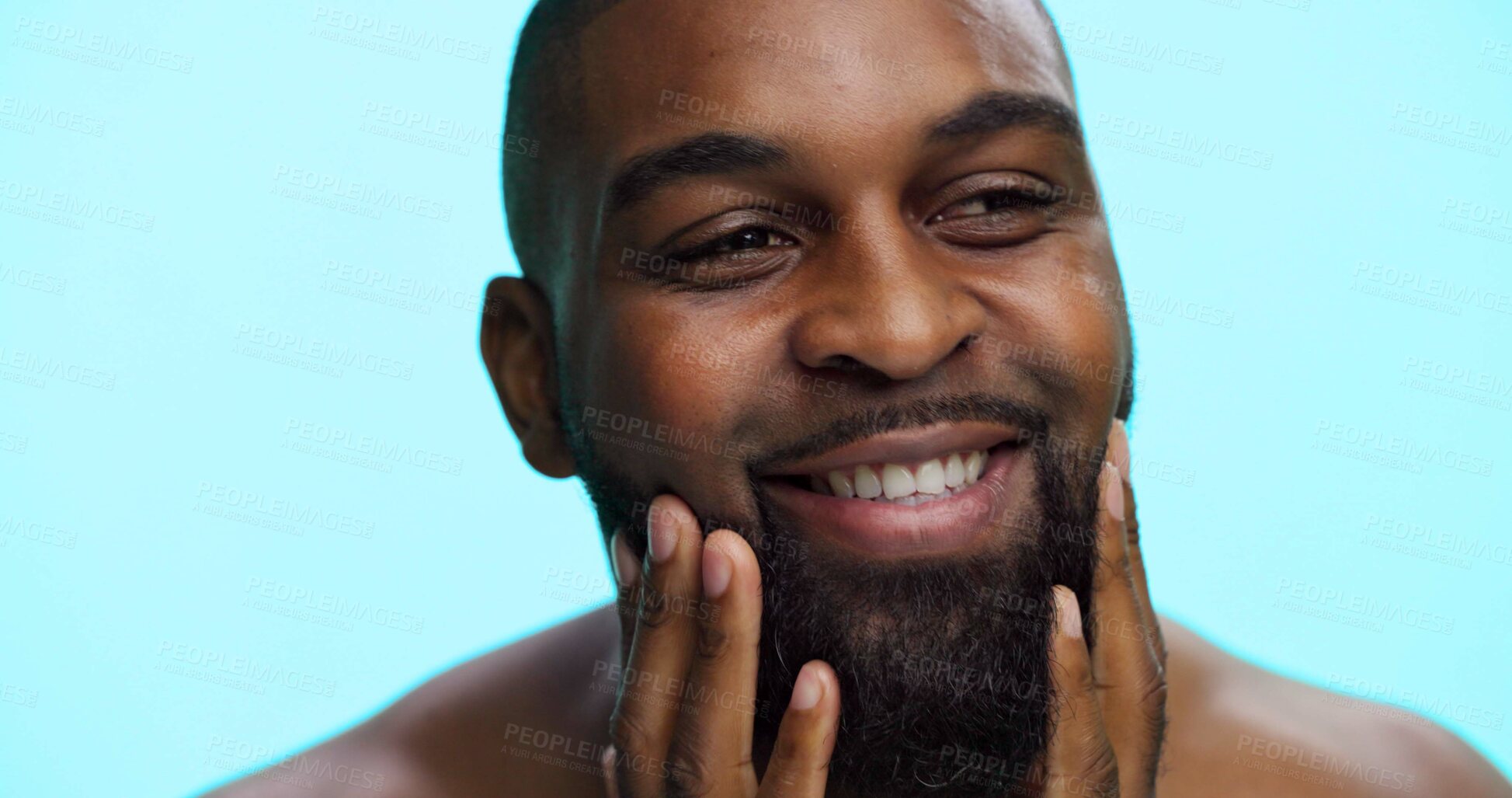 Buy stock photo Face, black man and beard with smile for beauty, haircare wellness and cosmetics on blue background. Facial hair, self care and healthy glow with male person in studio, dermatology and grooming