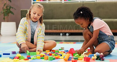 Buy stock photo Building blocks, fun and kids in psychology waiting room with cognitive development or growth. Friends, creative and girl children playing with educational toys for sensory or motor skills at clinic.