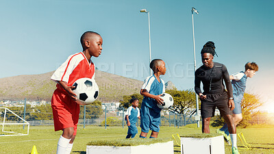 Buy stock photo Children, drill and ball for soccer practice for fitness training, balance exercise and sports workout. Kids, box and equipment for playing game, learning skills and team challenge for match activity