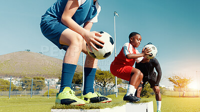 Buy stock photo Kids, jumping and ball for soccer practice for fitness training, balance exercise and sports drill. Children, box and equipment for playing game, learning skills and team challenge for match activity