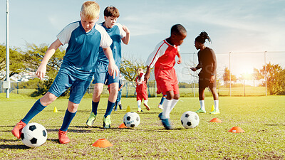 Buy stock photo Playing, soccer player and children with ball, kick and athlete with energy for practice in morning. Sports field, football and kids with sportswear for game, growth and development with fitness