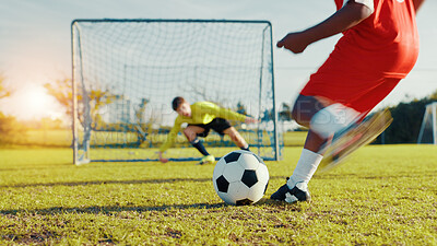 Buy stock photo Goal, soccer player and children with ball, kick and athlete with energy, cardio and practice in morning. Sports field, football and kids with sportswear for game, growth and development with fitness