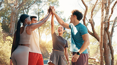 Buy stock photo Happy people, fitness and high five in huddle for workout goals, winning or teamwork in nature. Active, group or friends with smile or motivation for success, exercise or health and wellness together