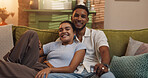 Happy couple, relax or watching tv with sofa for online entertainment, show or movie at home. Man, woman or lovers with smile or laughing on couch for humor, comedy or streaming subscription at house