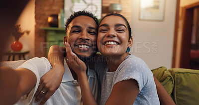 Buy stock photo Happy couple, portrait and hug with selfie for picture, photography or memory together at home. Face, man and woman with smile or embrace in joy for love, care or capture moment on sofa at house