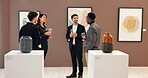 People, art and meeting with champagne at gallery for event, audience chat and talking for auction. Men, woman and wine glass for discussion, artwork collection and negotiation of exhibition showroom