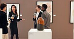 People, art and talking with champagne at gallery for event, audience chat and sculpture auction. Men, woman and wine glass for discussion, artwork collection and explaining negotiation of exhibition