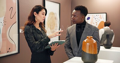 Buy stock photo Woman, man and vase with tablet in art gallery for negotiation, discussion and explain deal. People, ceramics and customer with museum, guide and display with culture, talent or sculpture at event