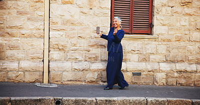 Buy stock photo Mature businesswoman, dancing and phone in city with earphones, smile and notification for salary increase. Person, smartphone and listening to music with celebration, goals or achievement in Mexico