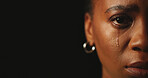 Portrait, crying and sad woman in studio for stress, ptsd and mental health on background. Tears, half face and unhappy person with trauma from abuse, crisis and depression with mockup space closeup